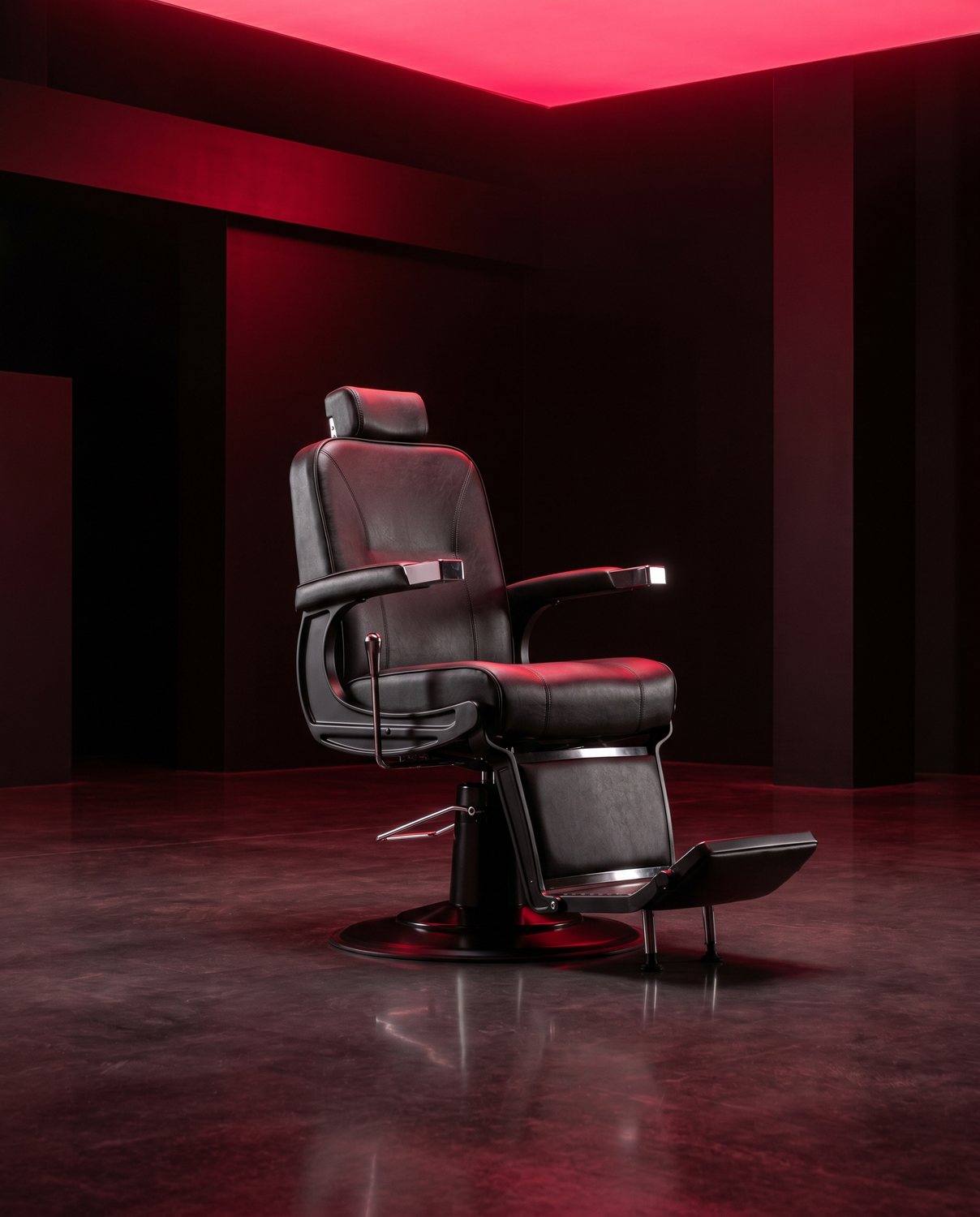 A modern black barber chair washed in red neon