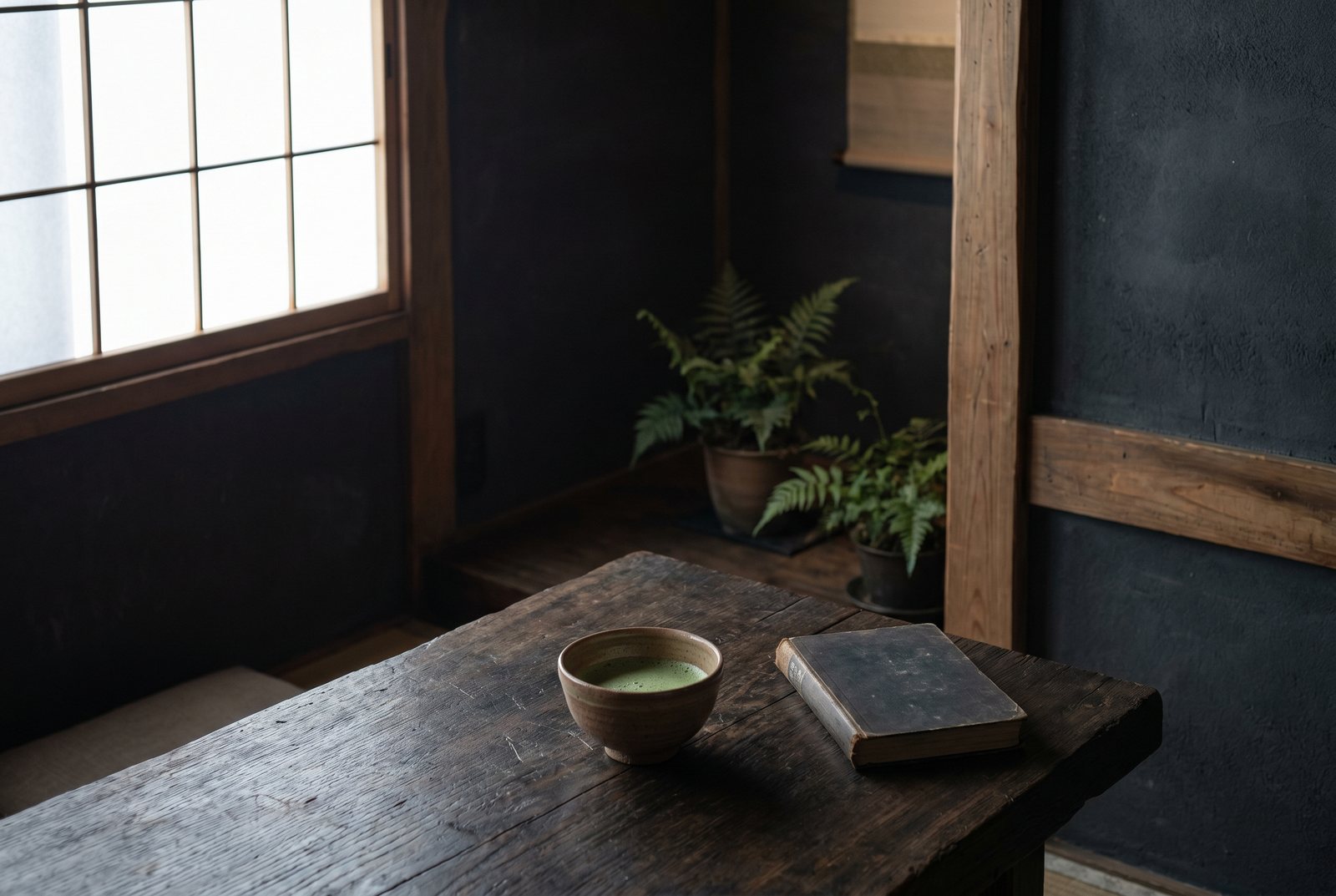 A calm timber table by the window in daylight