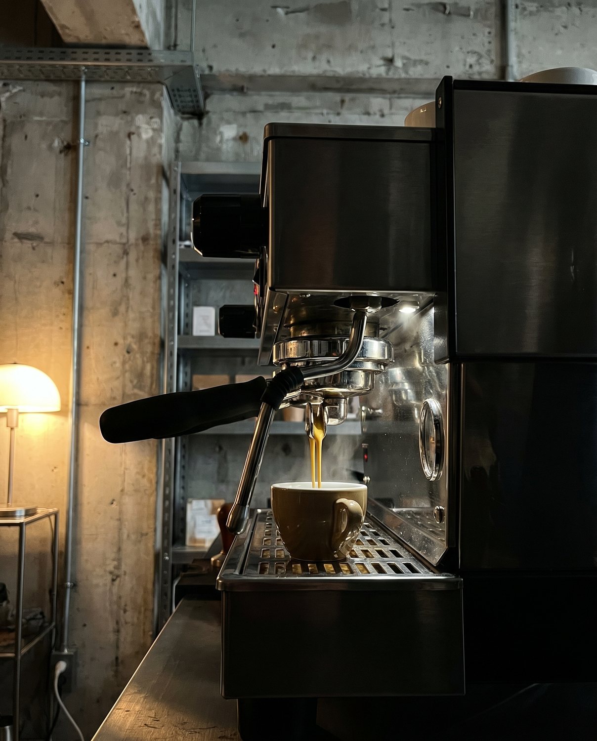 An espresso shot pulling into a cup