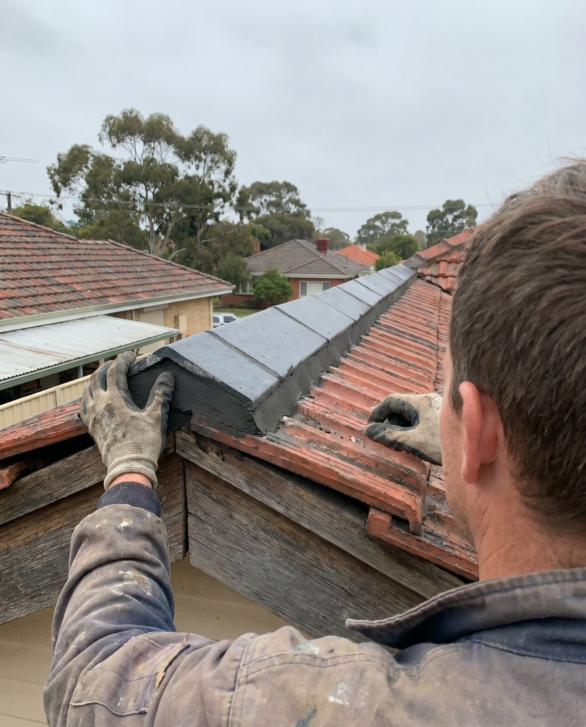 The same ridge re-bedded and re-pointed cleanly